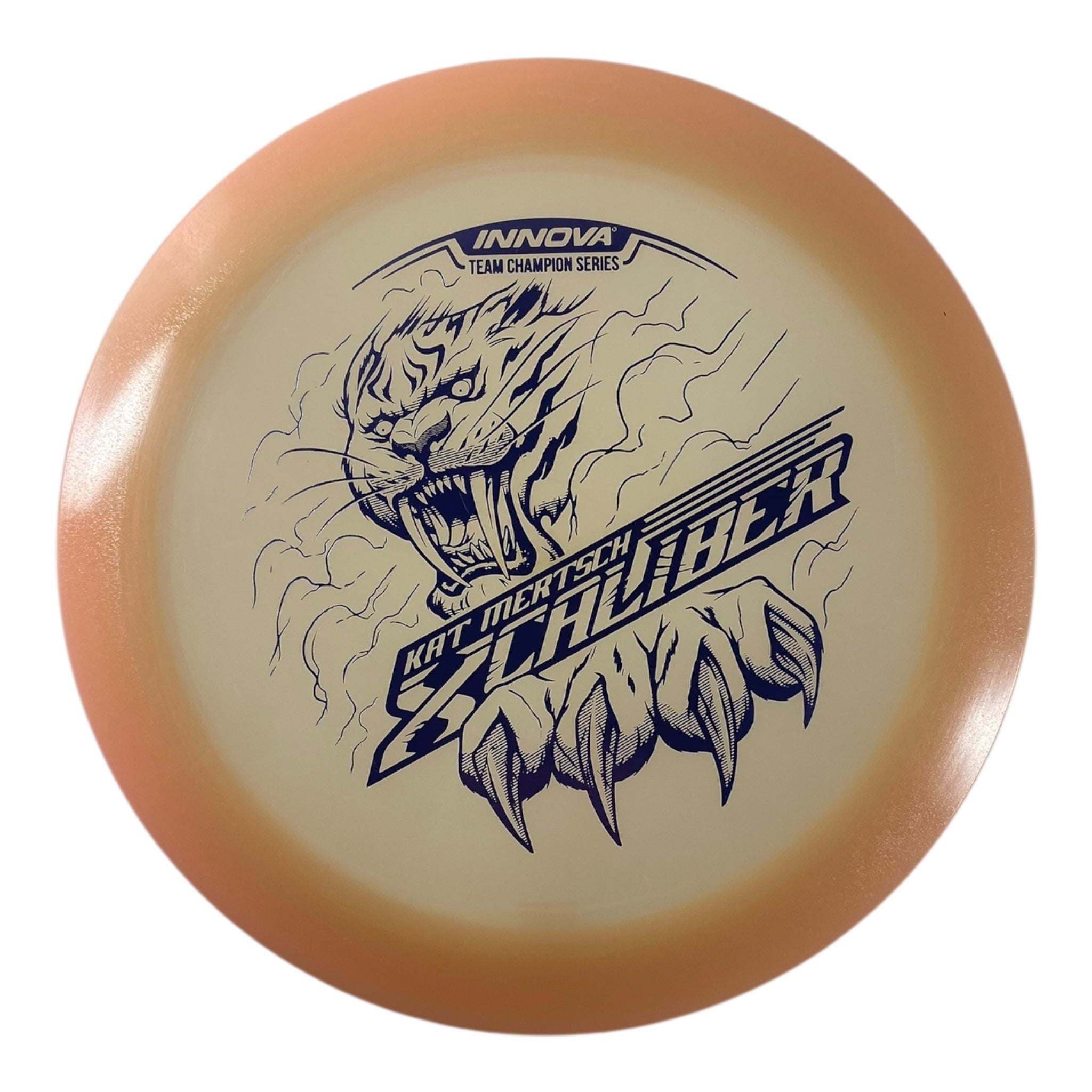 Innova Champion Discs XCaliber | Champion Color Glow | Tan/Purple 175g (Kat Mertsch) Disc Golf
