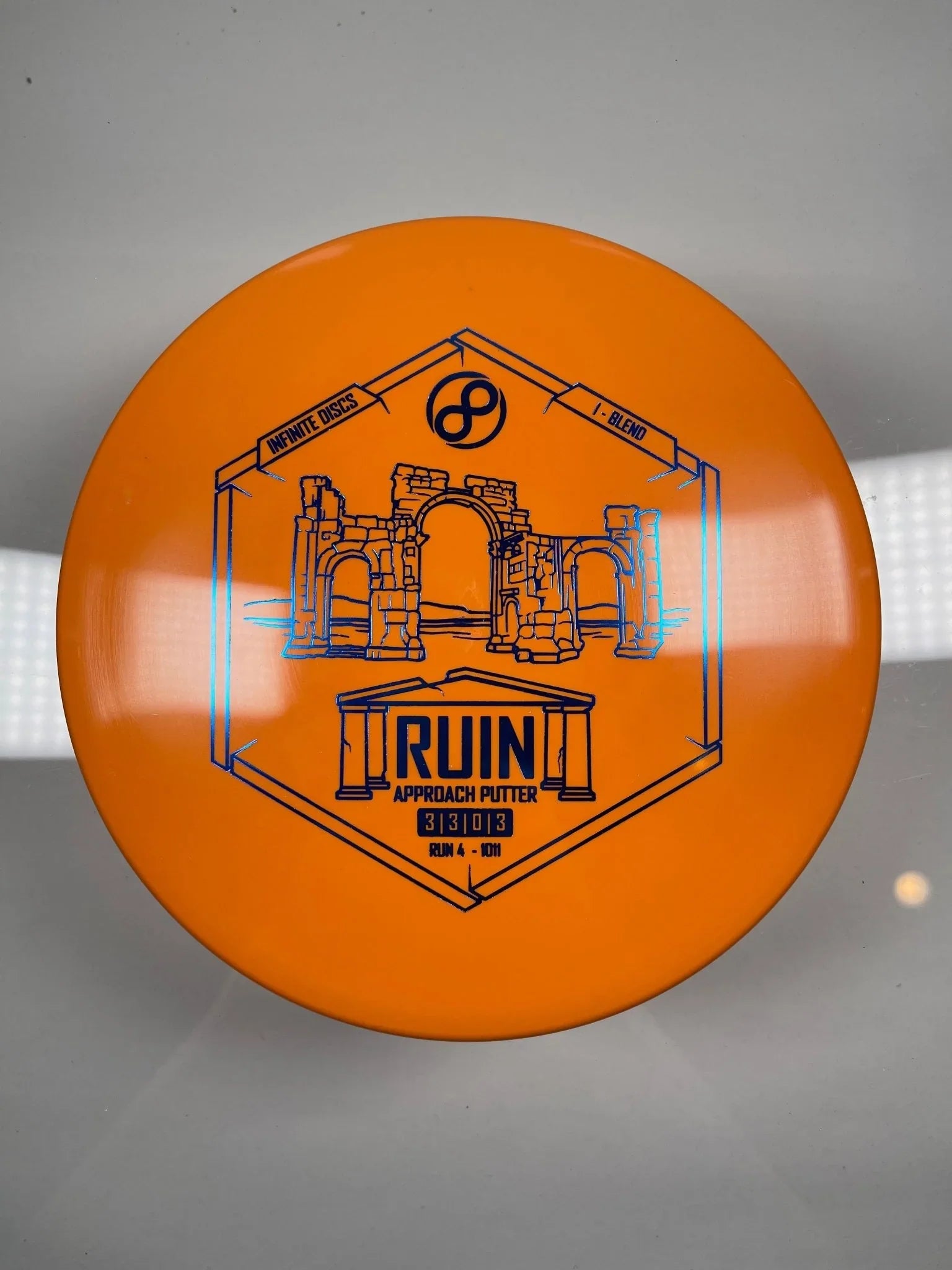 Infinite Discs Ruin | I - Blend | Orange/Blue 166g Disc Golf