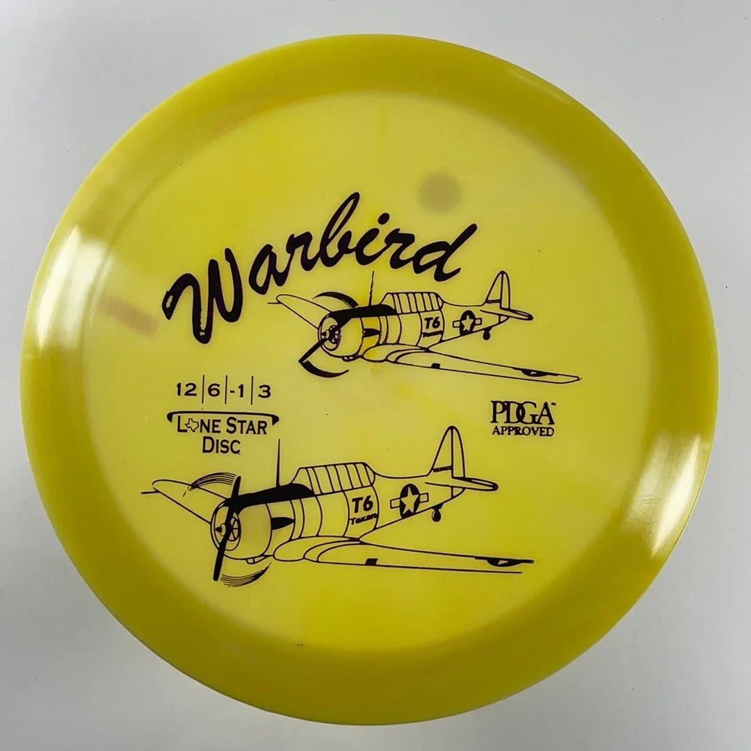 Lone Star Disc Warbird | Alpha | Yellow/Purple 172g Disc Golf