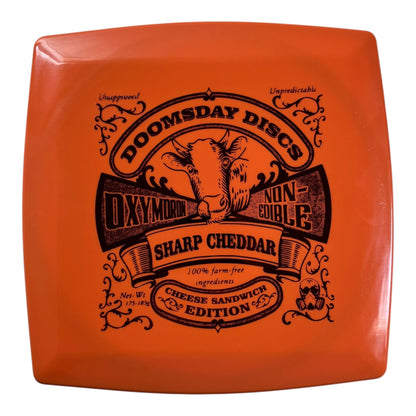 Doomsday Discs Oxymoron | Survival | Orange 177+g (Sharp Cheddar Cheese Sandwich Edition) Disc Golf