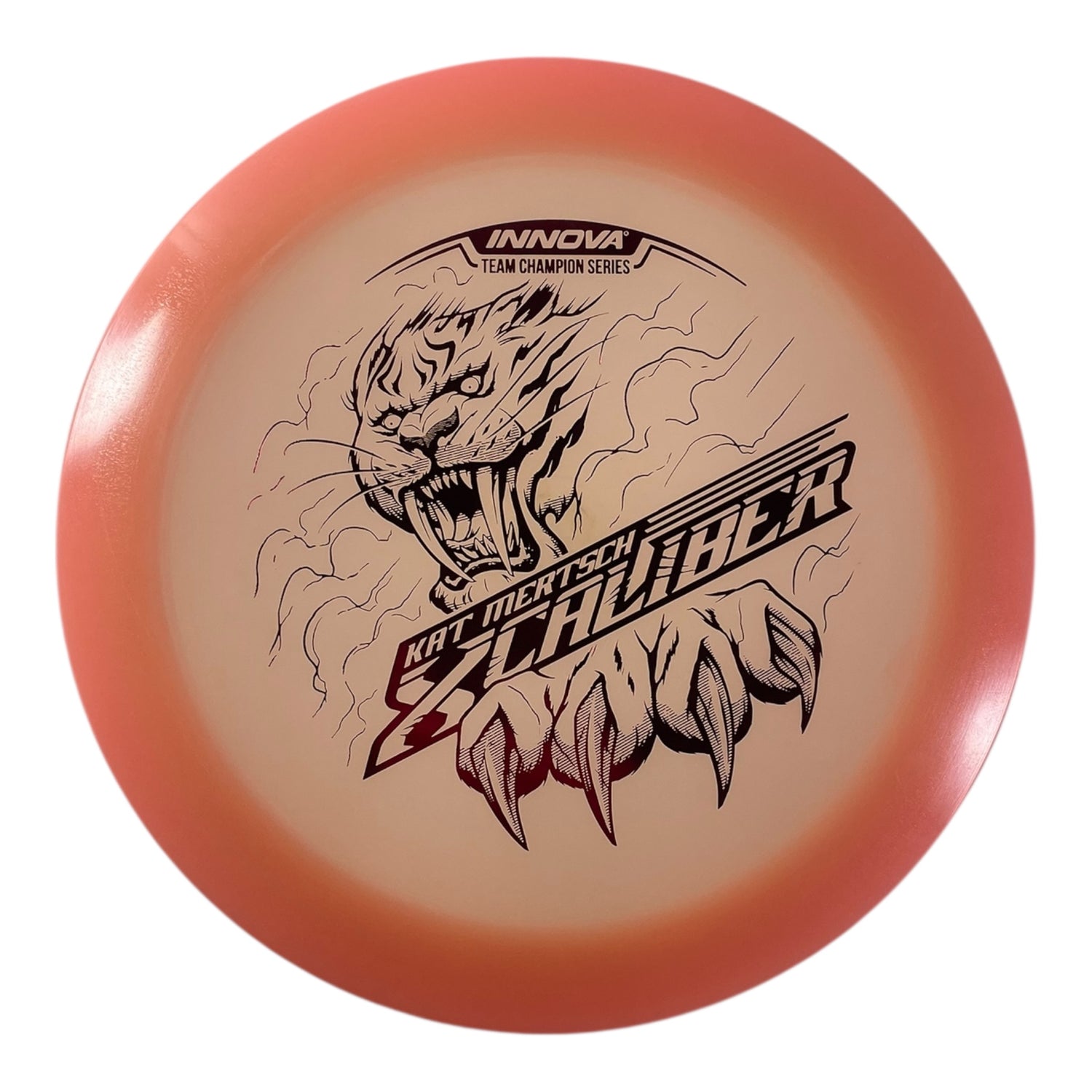 Innova Champion Discs XCaliber | Champion Color Glow | Tan/Pink 175g (Kat Mertsch) Disc Golf