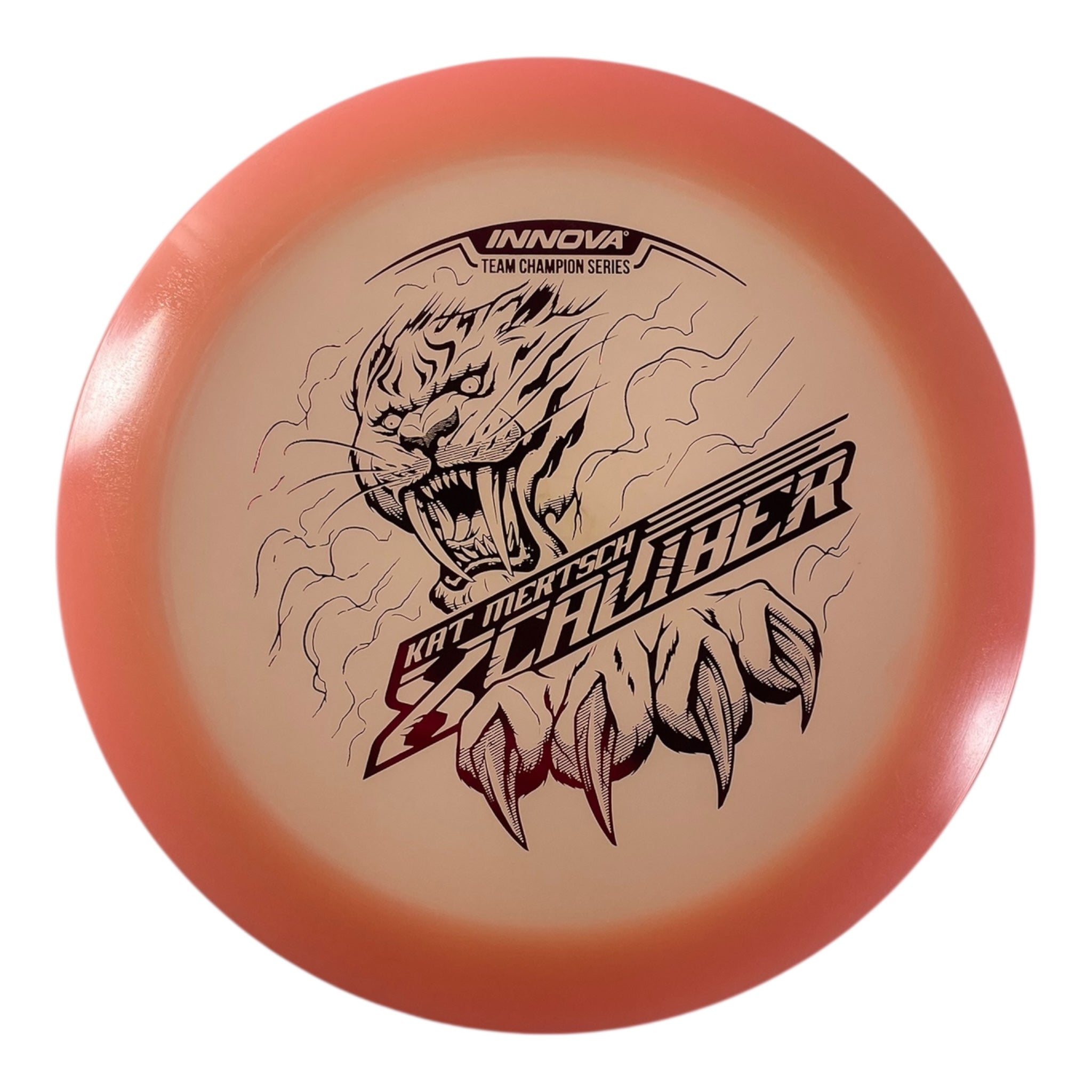 Innova Champion Discs XCaliber | Champion Color Glow | Tan/Pink 175g (Kat Mertsch) Disc Golf