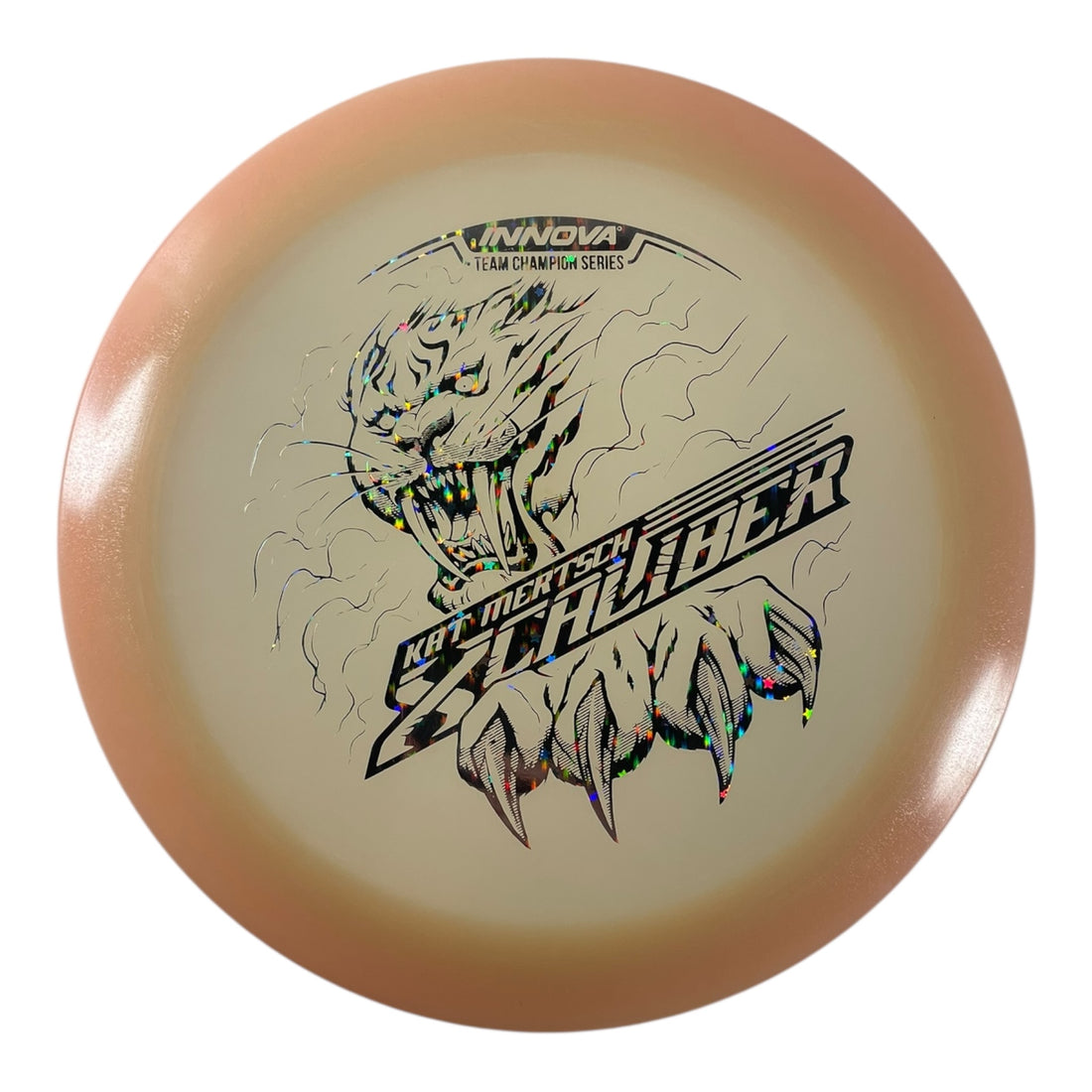 Innova Champion Discs XCaliber | Champion Color Glow | Tan/Stars 175g (Kat Mertsch) Disc Golf
