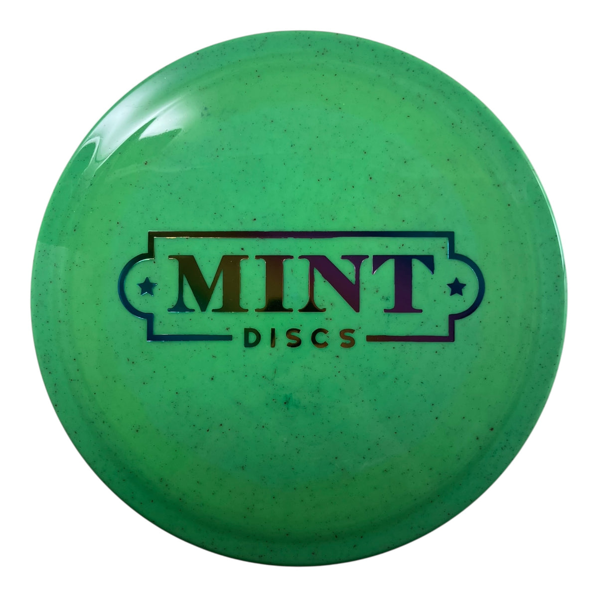 Green Mint Discs frisbee with speckled design and bold logo for disc golf enthusiasts