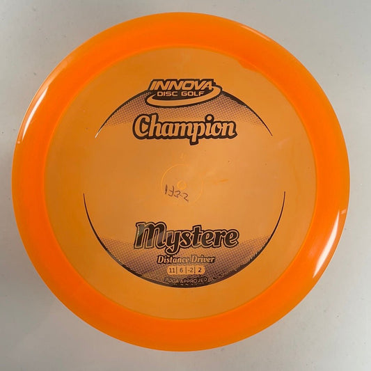 Innova Champion Discs Mystere | Champion | Orange/Stripes 175g Disc Golf