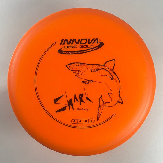 Innova Champion Discs Shark | DX | Orange/Black 165g Disc Golf