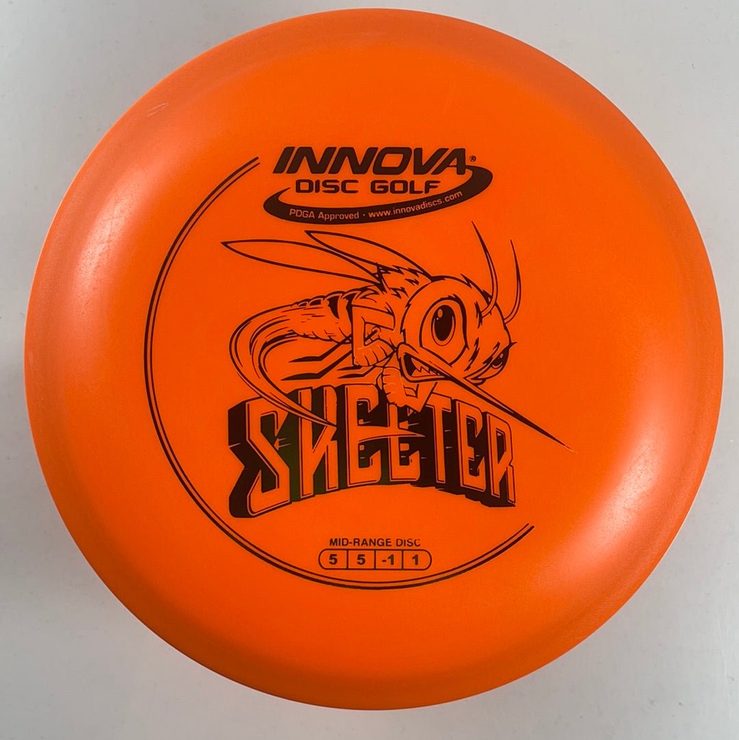 Innova Champion Discs Skeeter | DX | Orange/Green 170g Disc Golf