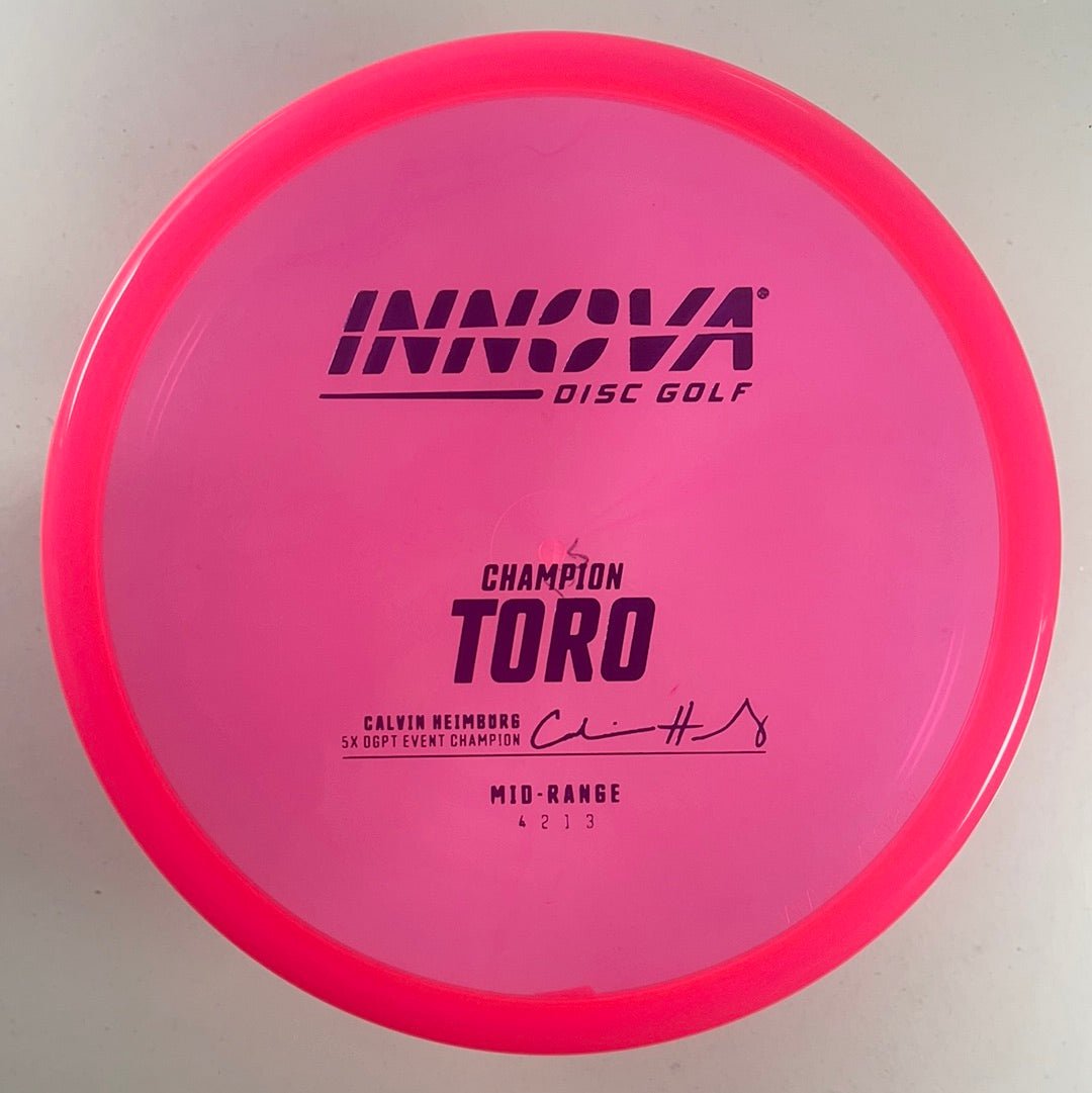 Innova Champion Discs Toro | Champion | Pink/Purple 171-172g Disc Golf